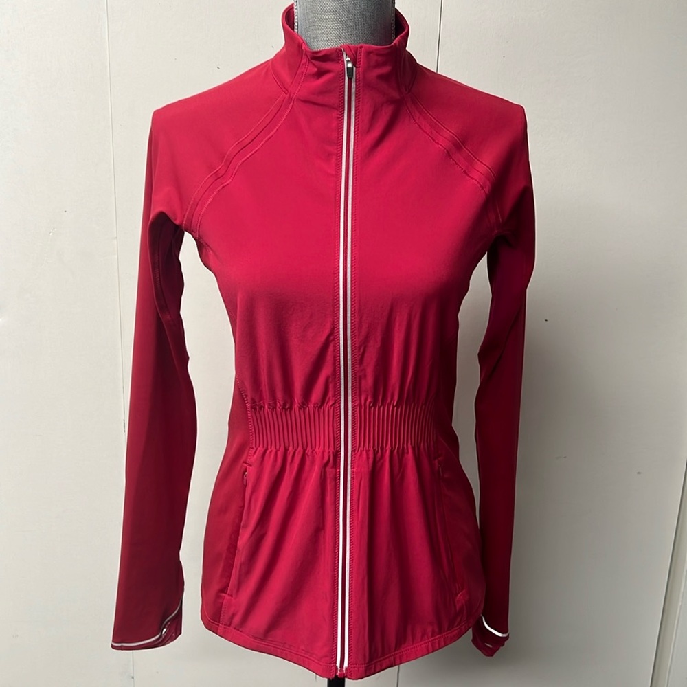 Athleta brand running jacket, beautiful cranberry pink with reflective stripes
